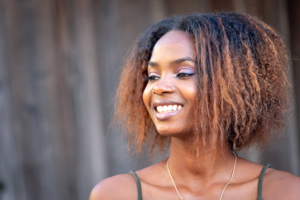istock Smiling Beautiful black young woman 1061861708