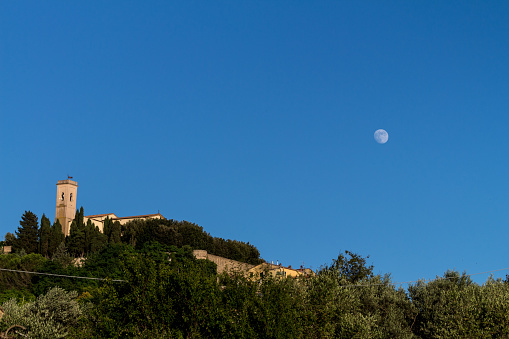Moon over Montescudaio in Tuscany