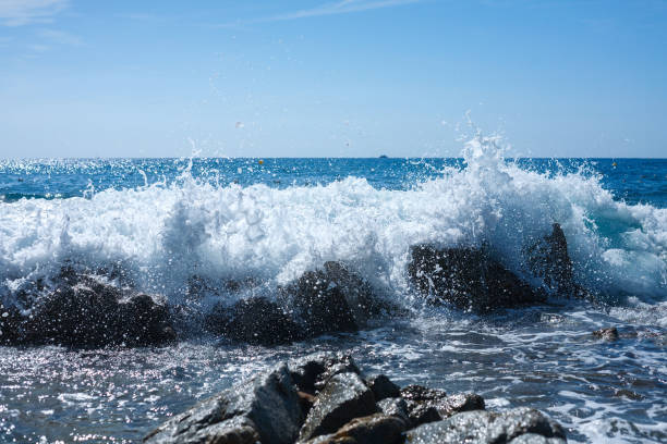 istock Wave crashing against a rock. Lloret de Mar. Spain 1061867066