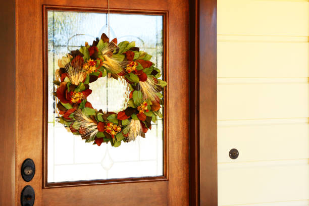 istock A Thanksgiving Day Wreath Hanging On Front Door 1061872066