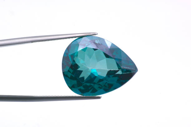 istock Macro image of a polished teardrop-shaped topaz gem 1061874090