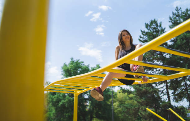 istock Woman exercising in a public park 1061875220