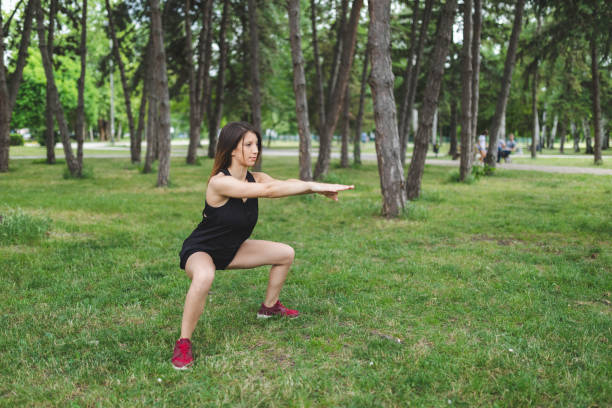istock Woman exercising in a public park 1061877814
