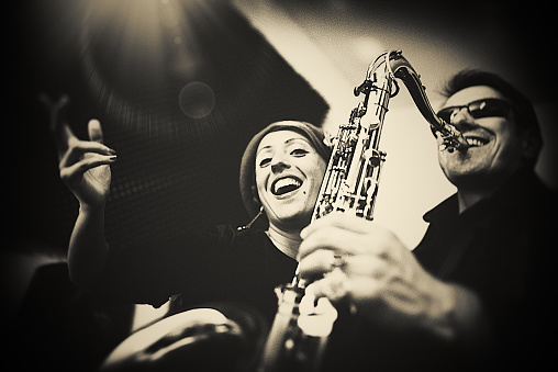 Fine Art Portrait from a Saxophone Player and a beautiful singer in a Jazz Club