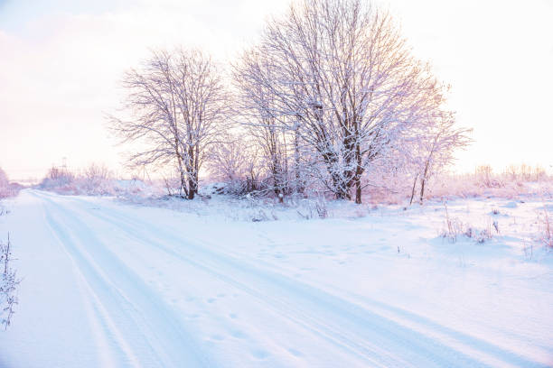 istock winter road at sunrise 1061879910