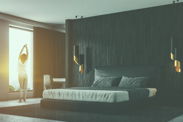 istock Black wood master bedroom corner, woman 1061881462