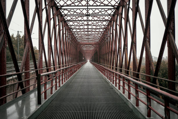istock Empty steel bridge on a rainy day 1061885932