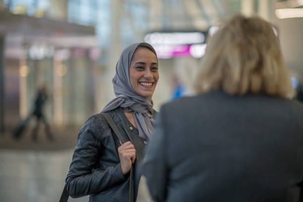 istock Young middle eastern women at the airport 1061886430