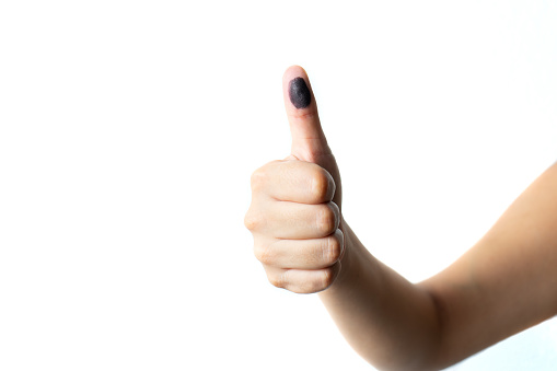 female finger marked after vote