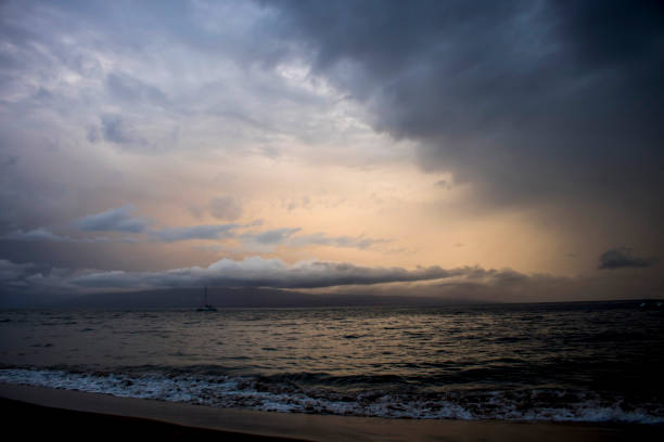 istock Sunset Seascape with Contrasting Colorful Clouds as Hurricane Approaches 1061901688