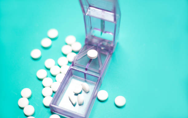 Pill Splitter, Pills, Turquoise Background