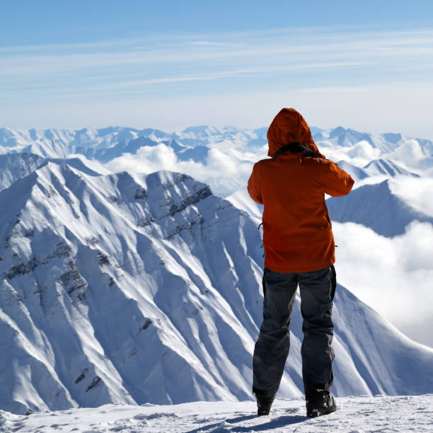 istock Skier on top of snowy mountain 1061916330