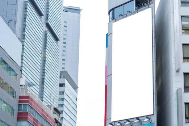 istock Blank billboard or advertising poster on the building wall mock up, for advertisement concept background 1061916630