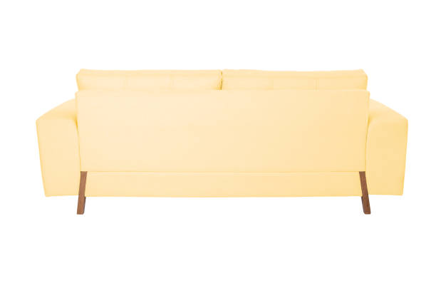 istock Three seats cozy white fabric sofa isolated on white background 1061918128
