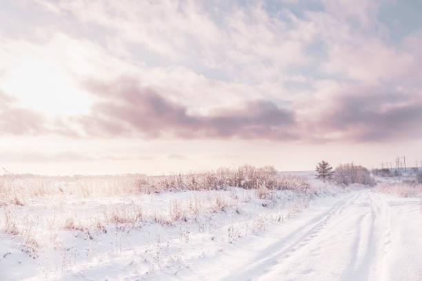 istock winter road at sunrise 1061927082