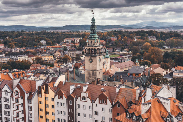 Old tenement houses in Klodzko with a town hall tower above them
