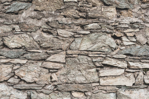 stone wall texture - stone textured italian culture textured effect imagens e fotografias de stock