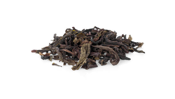 istock Dry leaf Green tea isolated on white 1061941558