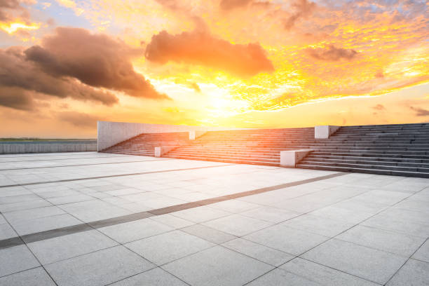 istock Empty floor and dramatic sky with coastline at sunset 1061951350