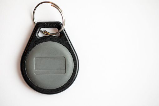 Electronic door entry key fob or bard on a white background