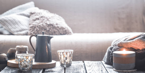 istock still life from home interior on a wooden background with a candle 1061975320