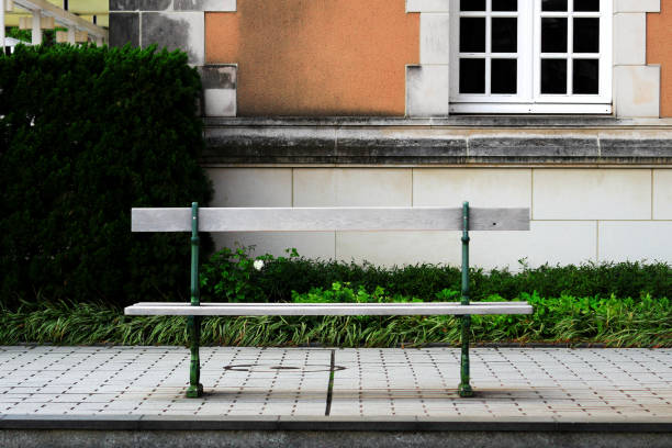 istock Stylish bench in the street corner 1061975554