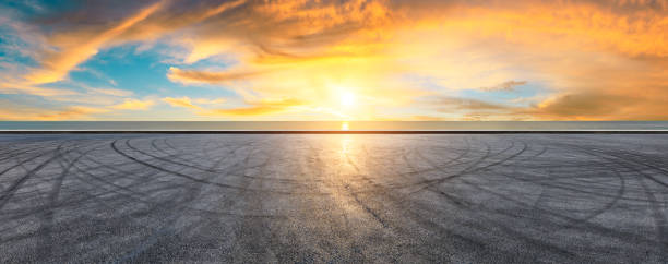 istock Circuit road and dramatic sky with coastline panorama at sunset 1061975582