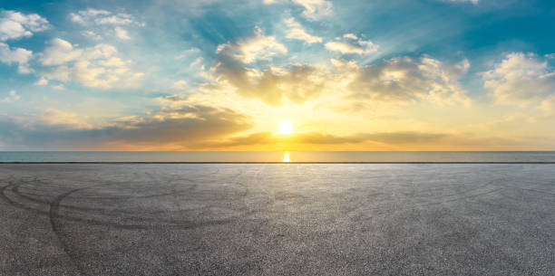 istock Circuit road and dramatic sky with coastline panorama at sunset 1061975702
