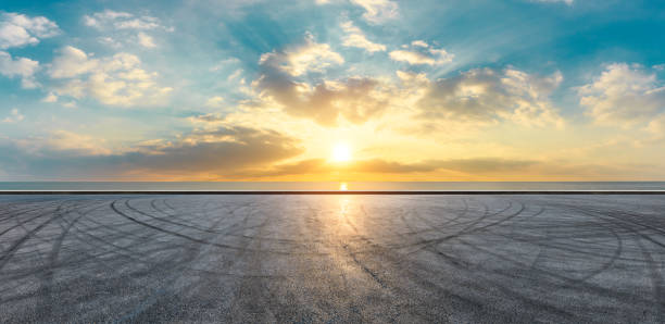 istock Circuit road and dramatic sky with coastline panorama at sunset 1061975706
