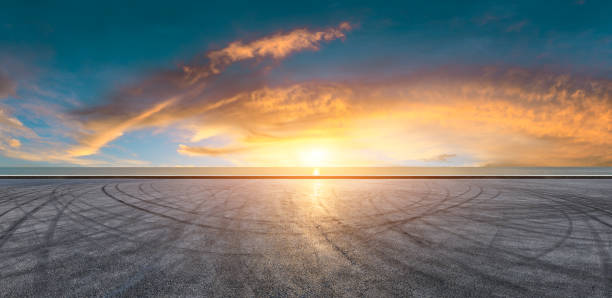 istock Circuit road and dramatic sky with coastline panorama at sunset 1061976848