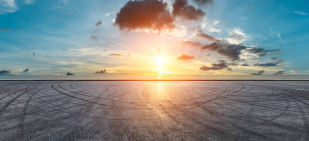 istock Circuit road and dramatic sky with coastline panorama at sunset 1061976908