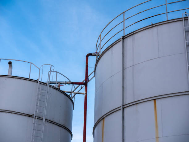 istock Harvested grain corn silos in factory 1061980898