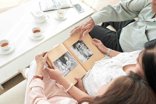 istock Enjoying old photos 1061981050