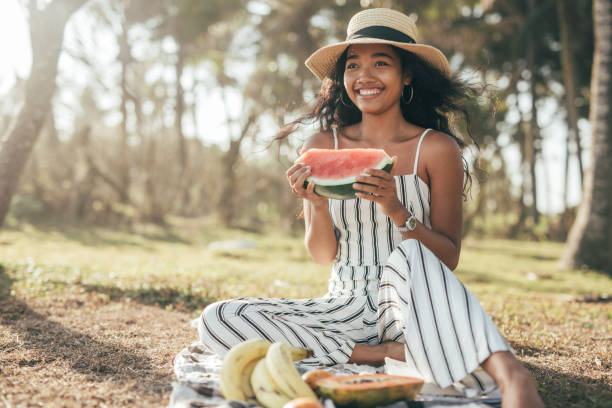 istock Girl eating a watermelon 1061983868