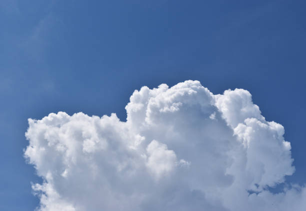 istock Cumulonimbus cloud formations on tropical sky 1061984892