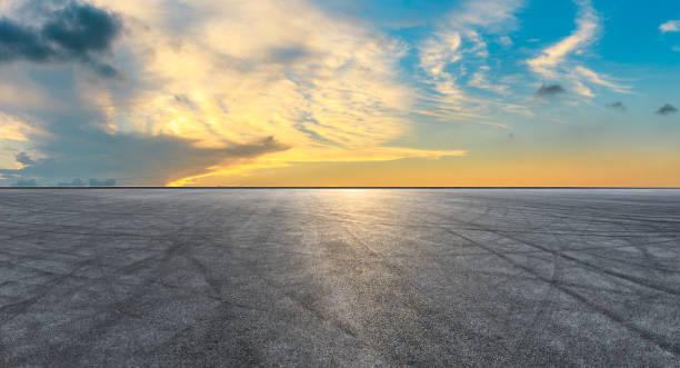 istock Circuit road and dramatic sky panorama at sunset 1061986528