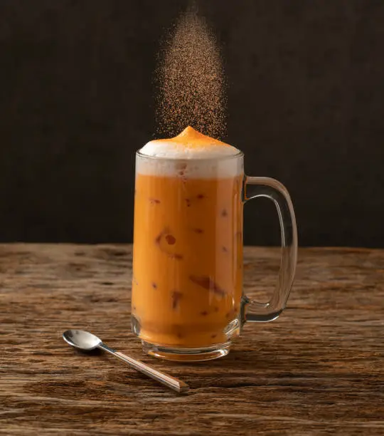 Photo of thai milk tea famous beverage drink traditional