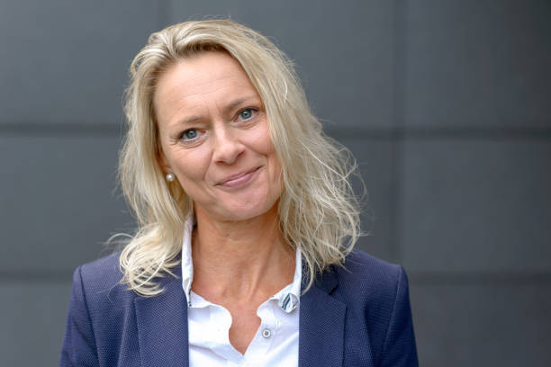 istock Mature blond woman looking intently at the camera 1061997042