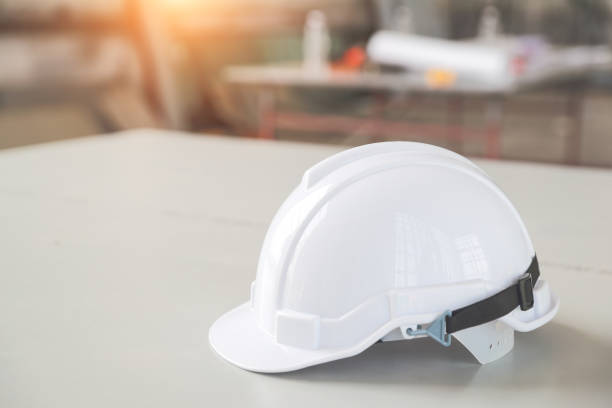 istock white safety helmet hat for worker and engineer at construction site 1062000768