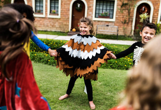 istock Little kids at a Halloween party 1062001068