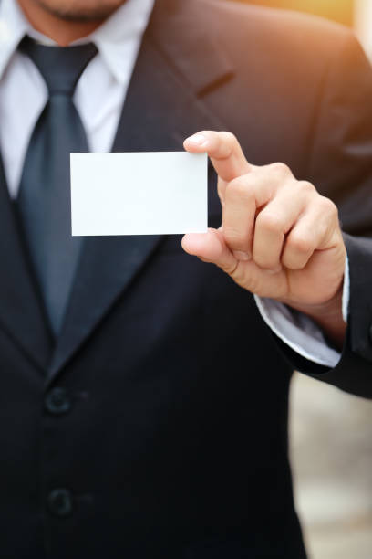 istock businessman giving blank name card 1062001104