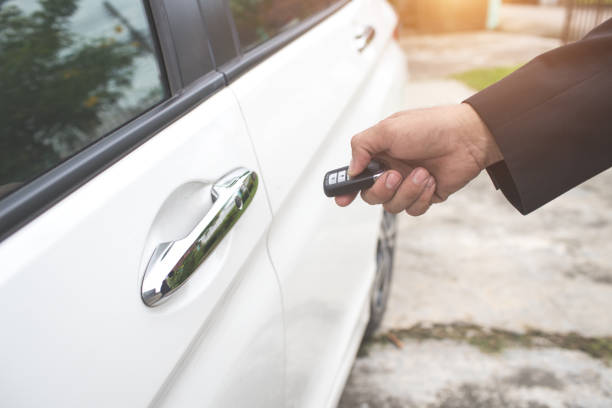 istock businessman open car door 1062001210