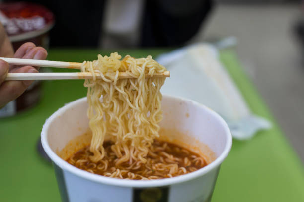 istock Instant noodles with chopsticks. cup noodles. cup ramen 1062007670
