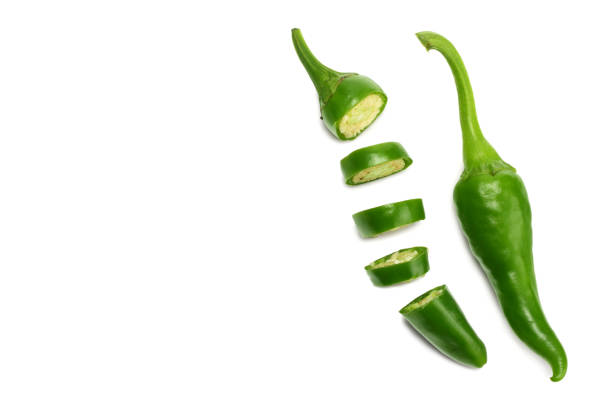 istock sliced green hot chili peppers isolated on white background top view 1062010152
