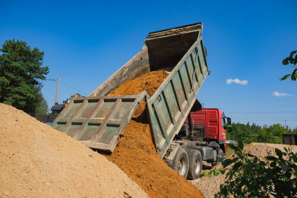 istock truck pours sand on the construction site 1062011054
