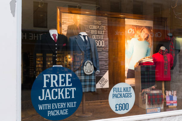 Shopcase of the clothing store Fort William, UK - March 17, 2018: Showcase of the clothing store on the High Street in Fort William, Scotland fort william stock pictures, royalty-free photos & images