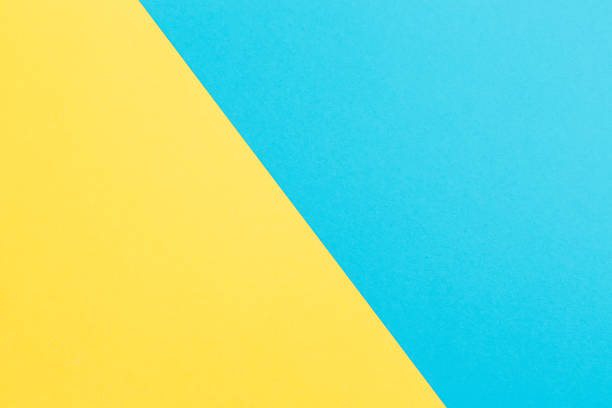istock Blue and yellow geometry texture background. Ukraine flag. Flat lay. Top view 1062020652