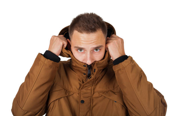 istock Young man wearing winter parka jacket 1062021044