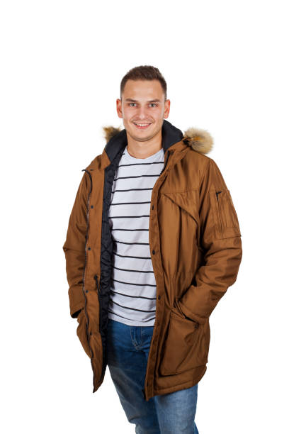 istock Young man wearing winter parka jacket 1062021252