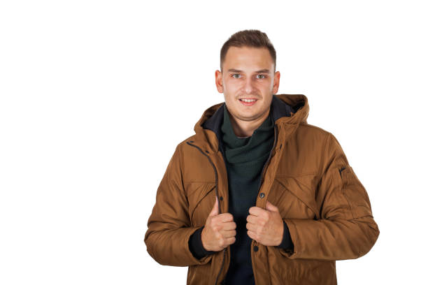 istock Young man wearing winter parka jacket 1062021304